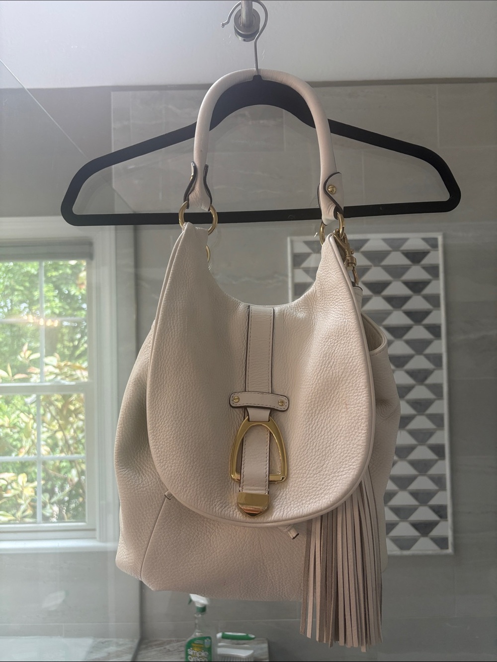 G.IL.I White pebbled purse/converts to backpack. Cute tassel